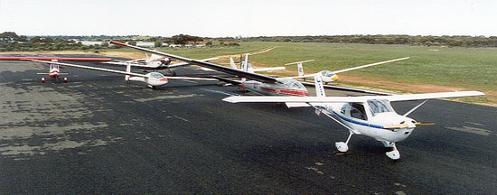 OLD fleet photo. Three ultralights, three gliders, one tug